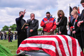 Father Edward Kennedy giving blessing for the soul of Sargent Major Alfred L. DeSerio