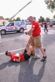 Physical Trainer James Mazzoni-Dalton helps Lloyd Fenner loosen up after today’s run.