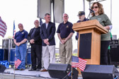 Emcee Sue Serio, FOX TV Weather Lady announces the presentation of colors and our National athem.