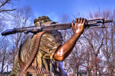 This soldier is slightly less specific in the service representation of his gear and uniform, but he appears to be a U.S. Army Soldier, as he wears a Tropical ("Boonie") Hat, which was widely worn by Army combat personnel in Vietnam
