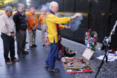 “Gary Thompson as an adopted member of the Navajo Nation, is doing a pipe ceremony over his medicine bundle. “Gary took his pipe and medicine bundle back to Vietnam in 2006 in order to complete his healing journey which started at the Wall in 1992”.