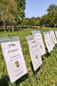 Nearly 700 family members, friends and veterans attended this year’s ceremony. Family members read aloud the names of their loved ones being honored and then placed tributes at the panel of The Wall that corresponds most closely to the honorees’ dates of service. Throughout the ceremony, volunteers and friends will read the names of the 1,874 past honorees.