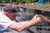 The Department of Defense is the agency responsible for deciding whose names go on The Wall, based on established criteria.  If the DOD determines that a Vietnam Veterans death was a direct result of severe physical, psychological and torture-related combat wounds inflicted by the enemy while he was held prisoner during the Vietnam conflict.
