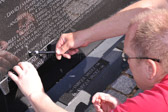 Work began on April 29 and ended with a formal ceremony on May 4 when the last name was added with many family members looking on.