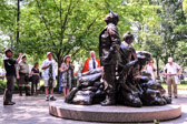 Vietnam Womens Memorial founder Diane Carlson Evans, RN, Vietnam, 1968-69, Army Nurse Corps, 1966-72 prepares to lay a wreath on statue figure.